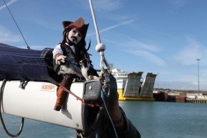 Cpn Jack & Fergus astride the boom in Newhaven with the RoRo in the background