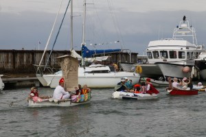 Kid's regatta with decorated boats and vikings, kings and squabbles aboard