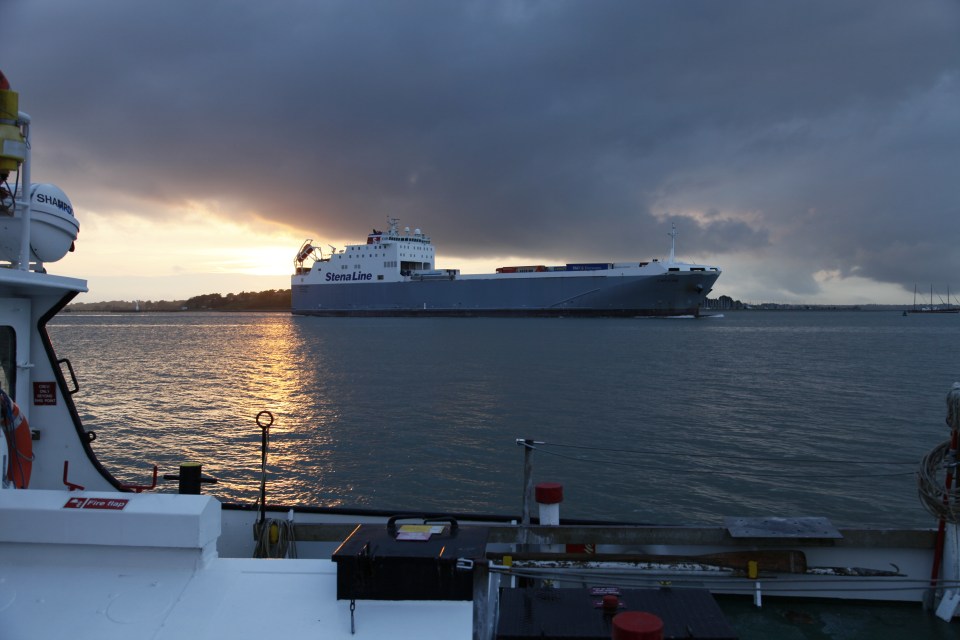 Amazing sky behind the truck ferry