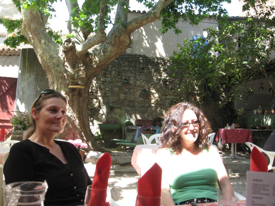 Relaxing in the sun at an al fresco cafe